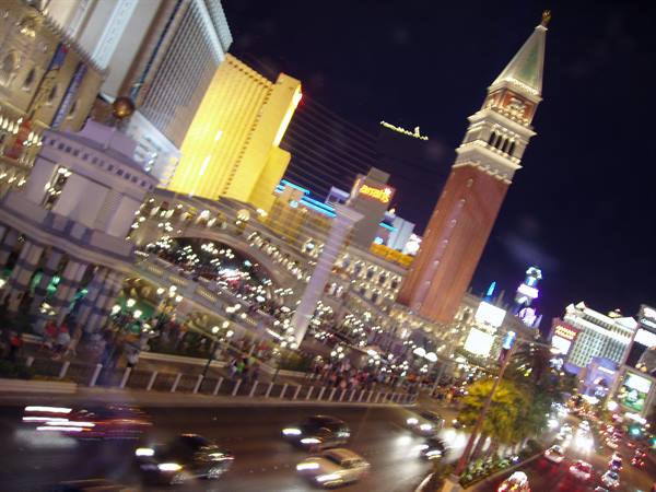 Las Vegas Strip at night: the Venetian's St Mark's campanile and blurred traffic