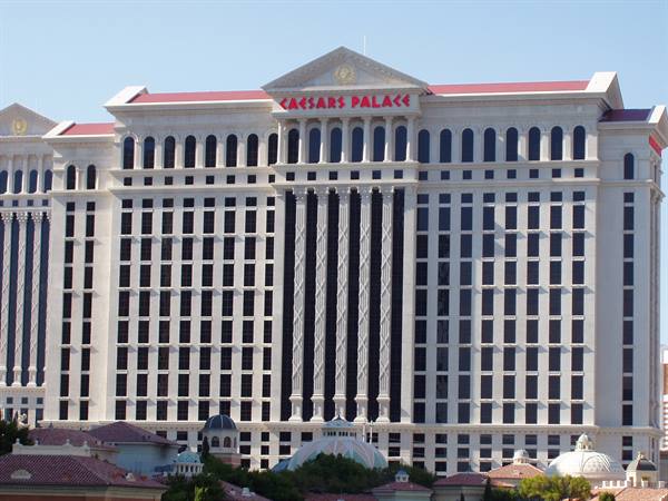 White facade of Caesars Palace hotel in Las Vegas, daylight