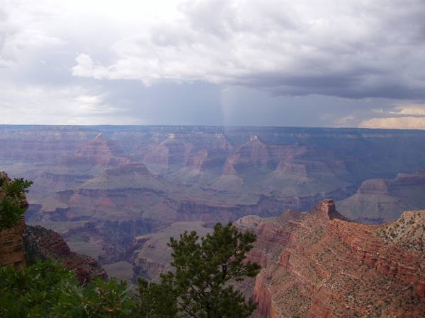 Grand Canyon: red rock and a rainstorm over the Colorado gorge