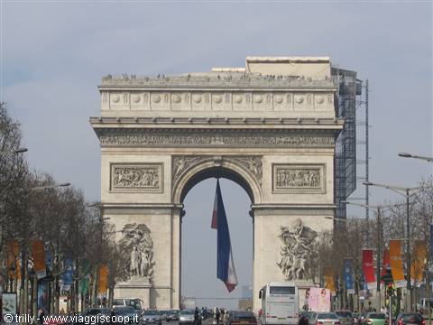 Arc de Triomphe with French flag hanging under the arch, traffic and scaffolding