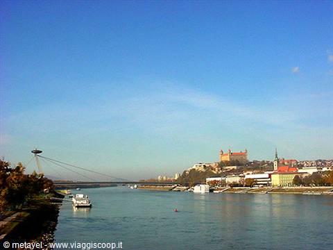 SNP Bridge over the Danube with Bratislava Castle on the hill