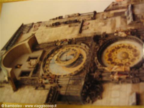 Medieval astronomical clock in Prague, blurry photo with golden dials