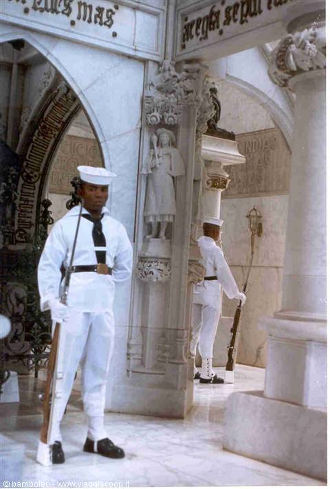 Sailors in white uniforms with rifles stand guard inside marble mausoleum, Christopher Columbus