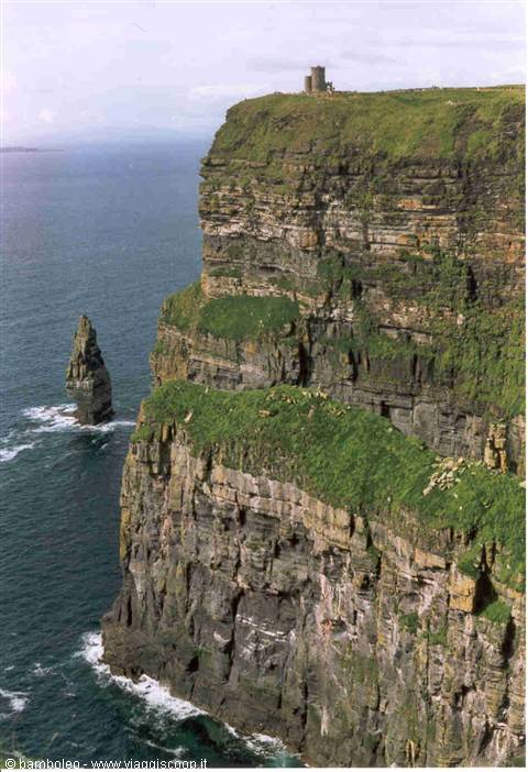 Cliffs of Moher, O'Brien's Tower above green rock facing the ocean