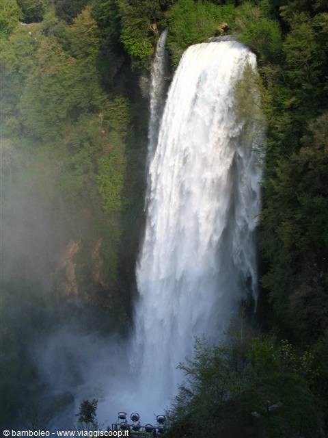 Marmore Falls, powerful white water cascading among lush green forest