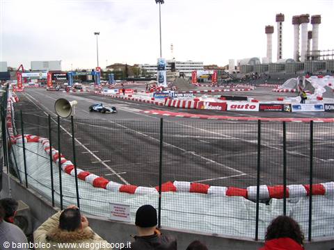 Urban kart track in Bologna, spectators behind the fence