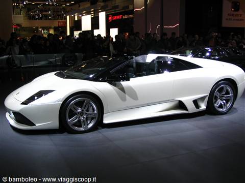 White Lamborghini Murciélago Roadster on display at the motor show among the crowd