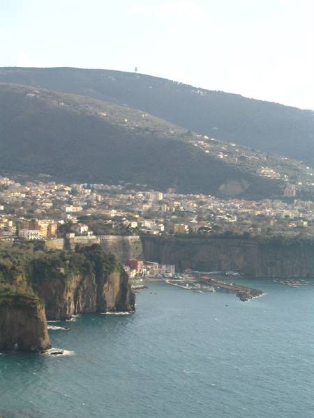 Marina Grande in Sorrento, boats in the harbor beneath tuff cliffs