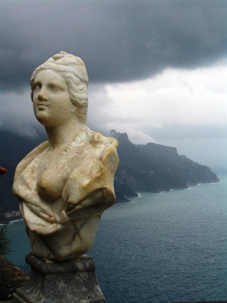 Marble bust of a woman on terrace above the sea, Ravello, cloudy coast