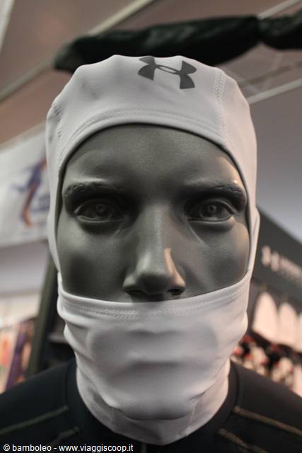Mannequin wearing a white Under Armour balaclava at a trade fair stand