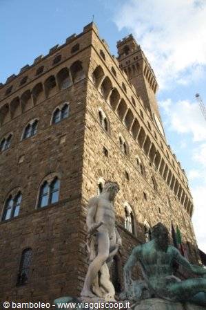 Palazzo Vecchio in Florence with the marble and bronze Neptune statue