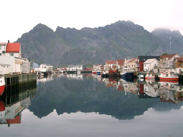 barges anchored in the fjord
