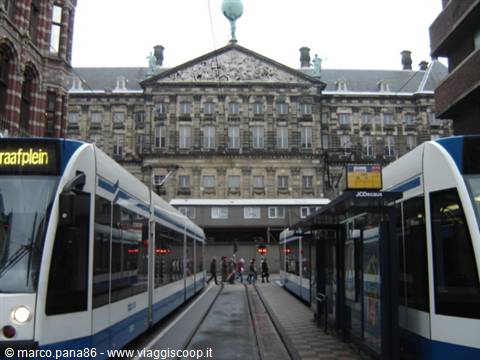 GVB trams at Dam square, with Amsterdam's Royal Palace in the background