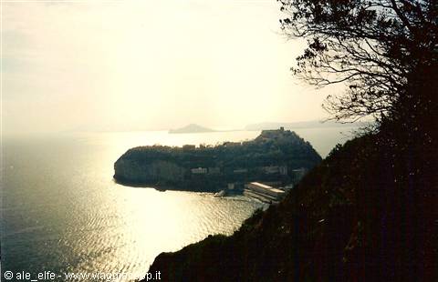 Nisida islet bathed in sunlight, the sea glittering off Naples