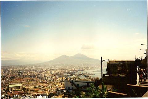 Naples with Mount Vesuvius in the background, buildings and harbor in clear light