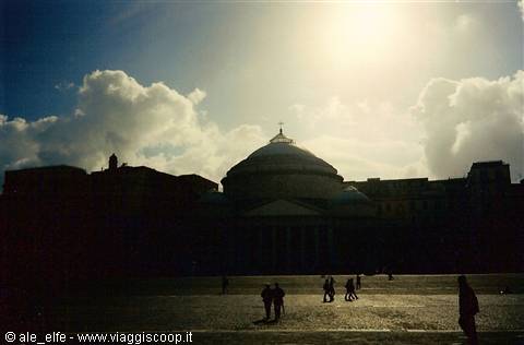 San Francesco di Paola basilica backlit, people walking across Piazza del Plebiscito, Naples
