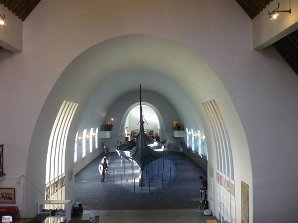 Viking Ship Museum in Oslo: wooden vessel beneath the white arched hall