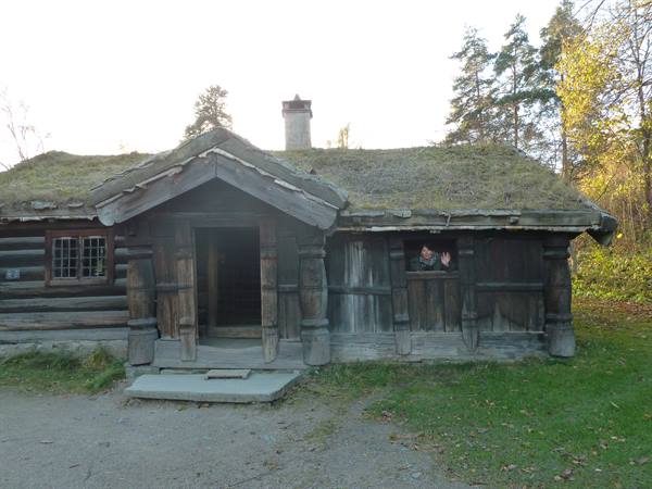 Old log farmhouse with turf roof at Bygdøy Folk Museum, Oslo