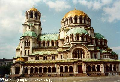 Alexander Nevsky Cathedral in Sofia, golden and green domes under cloudy sky