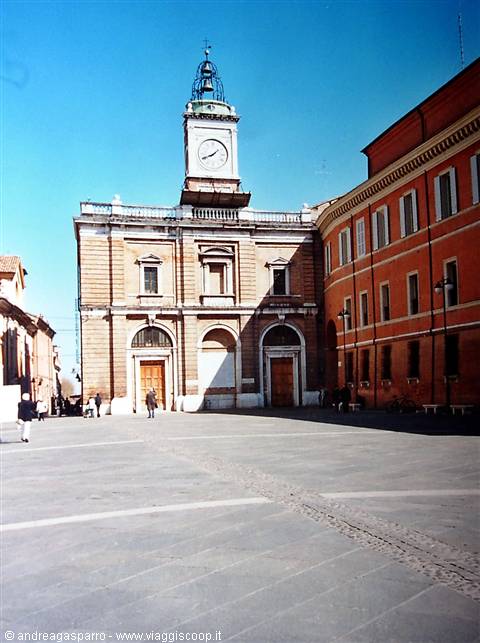 Brick town hall with clock and bell tower, Ravenna square