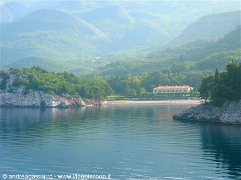 Seaside villa in the Bay of Kotor, green mountains and calm water