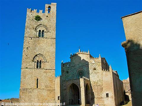 Stone bell tower beside the Chiesa Madre cathedral in Erice, blue sky
