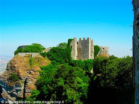 Venere Castle in Erice, medieval walls on rock among greenery