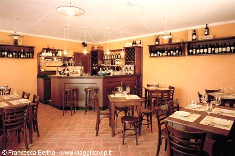 In the dining rooms of the Trattoria Quaglini of Borgo Priolo
