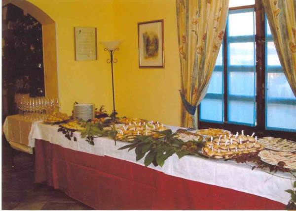 In the dining rooms of Ristorante Le Terre Rosse in Conzano