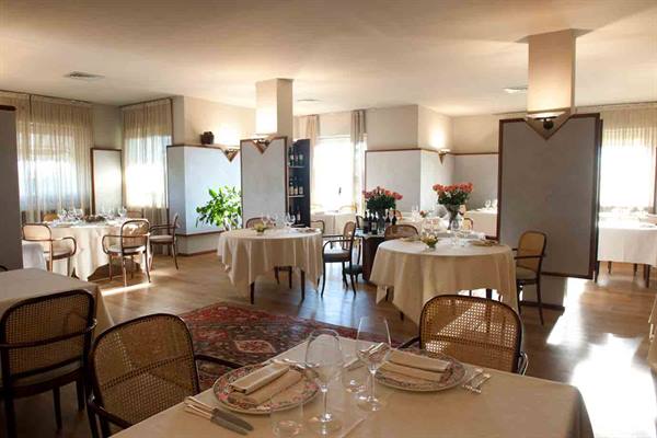 In the dining room of Ristorante La Fioraia in Castello di Annone