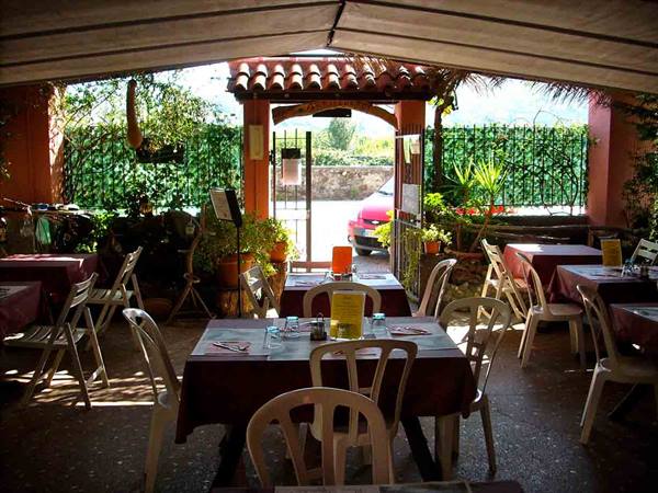 In the outdoor area of Trattoria La Pergola in Quiliano