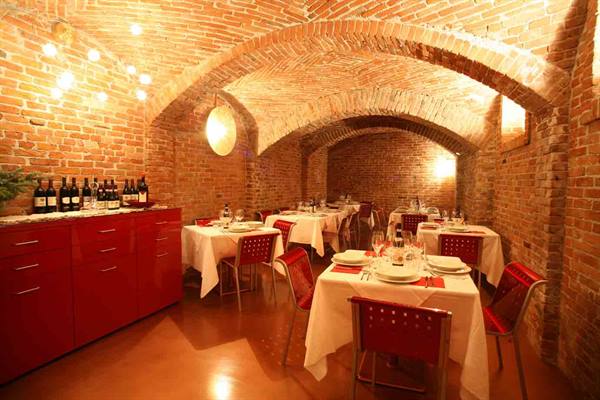 In the evocative dining room of Locanda Cortiletto d'Alba