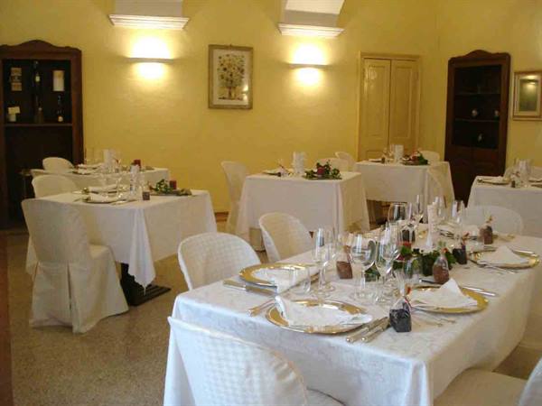 In the dining room of Ristorante Massimo, at Hotel Resort Il Convento