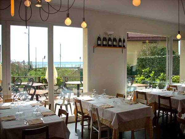 In the bright dining room of Ristorante Mezzo Marinaio