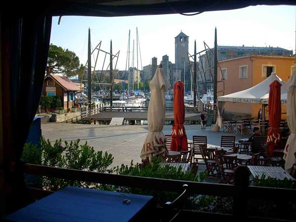 View of the Darsena from the outdoor area of Ristorante il Paguro
