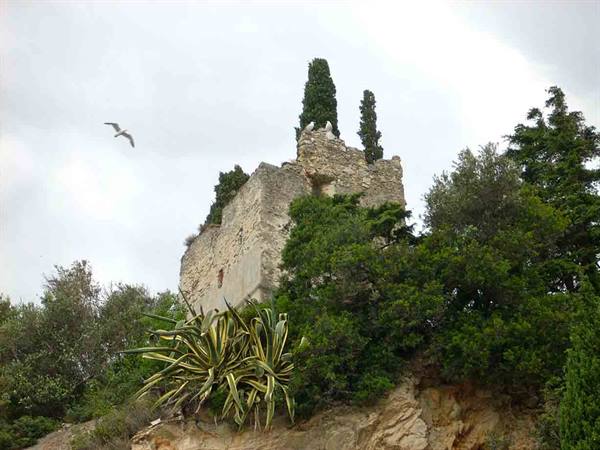 An ancient tower visible from the promenade