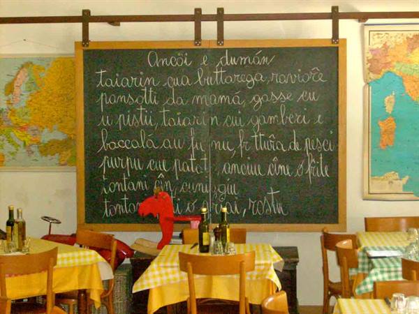 A school everyone would like to attend: here is the blackboard with the menu at Osteria dei Matetti