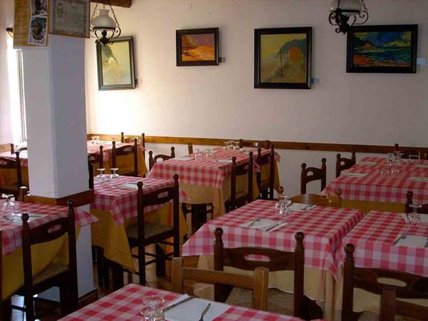A temporary exhibition in the dining room of Trattoria Marchi