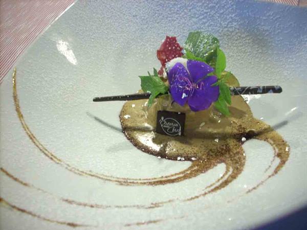 Ice-cold Sichuan pepper cream with coconut bon-bons and liquid licorice
