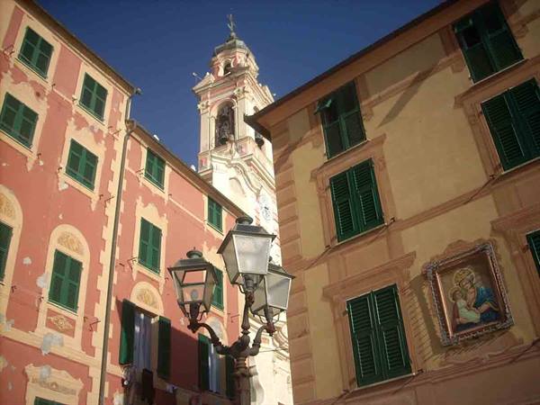 The bell tower rising among the houses