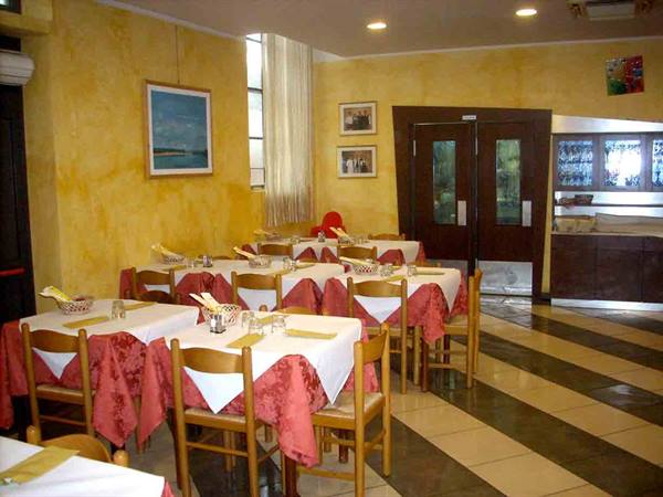 In the dining rooms of Trattoria Al Beccofino