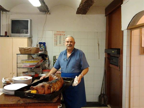 Pietro The Mustache with one of his specialties: the original Abruzzese porchetta
