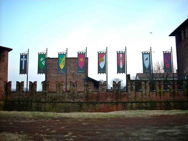 The castle of Legnano with the flags of the Palio