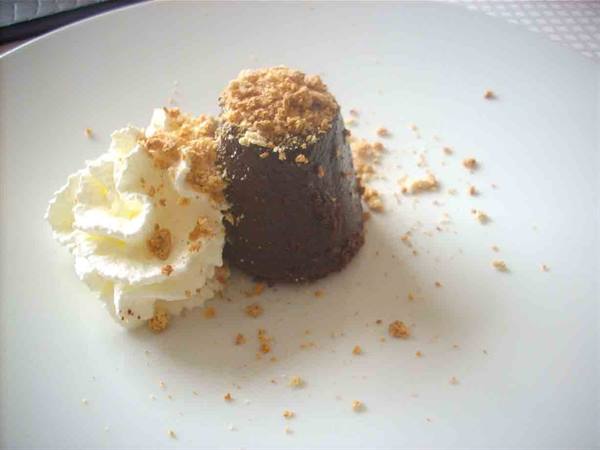Bunet with whipped cream and crumbled amaretti