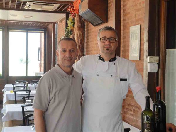The owners of Ristorante La Scuderia