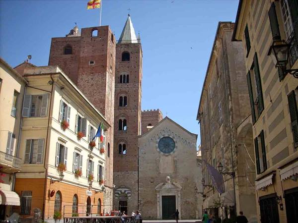 Romanesque cathedral and brick bell tower in Albenga square
