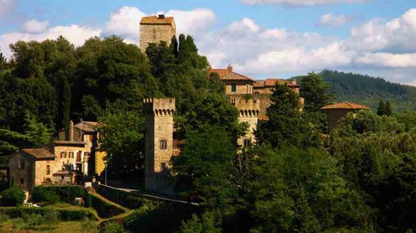 Verrazzano Castle, medieval stone towers among Tuscan woods