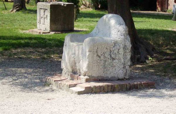 Attila's Throne, a stone chair on a brick base in Torcello