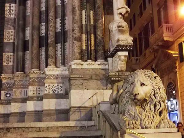 Stone lion at the base of Genoa Cathedral of San Lorenzo staircase