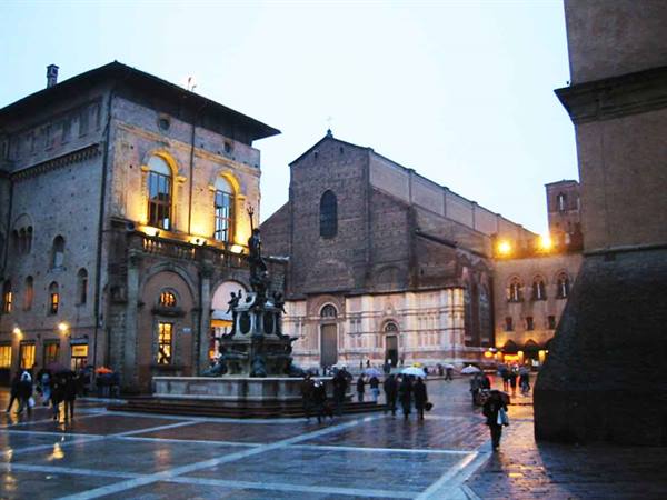 Piazza Maggiore in Bologna with the Neptune Fountain and San Petronio basilica